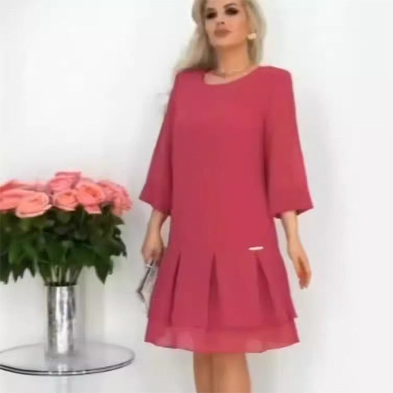 Elegantiška vienspalvė klostuota suknelė