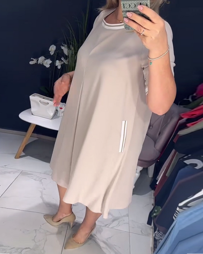 Elegantiška apvalios iškirptės suknelė
