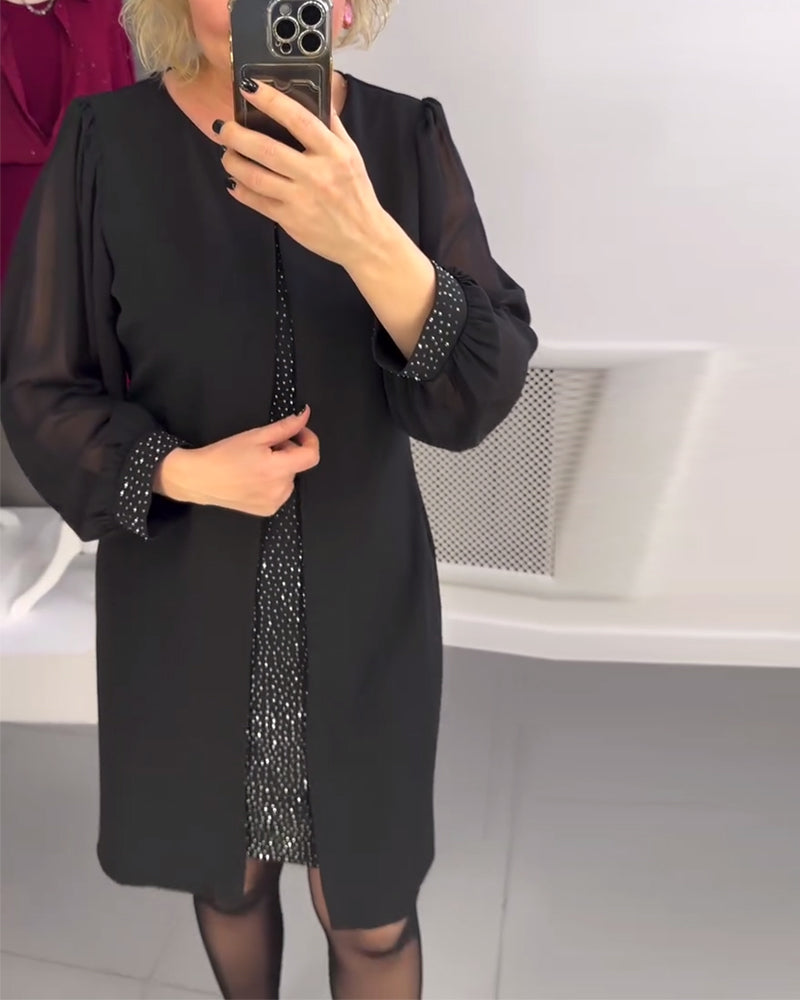 Žėrinti suknelė su skeltuku