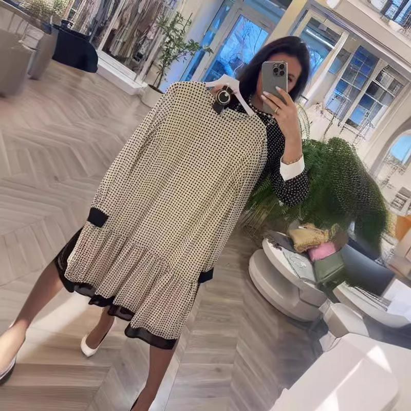 Elegantiška taškuota suknelė