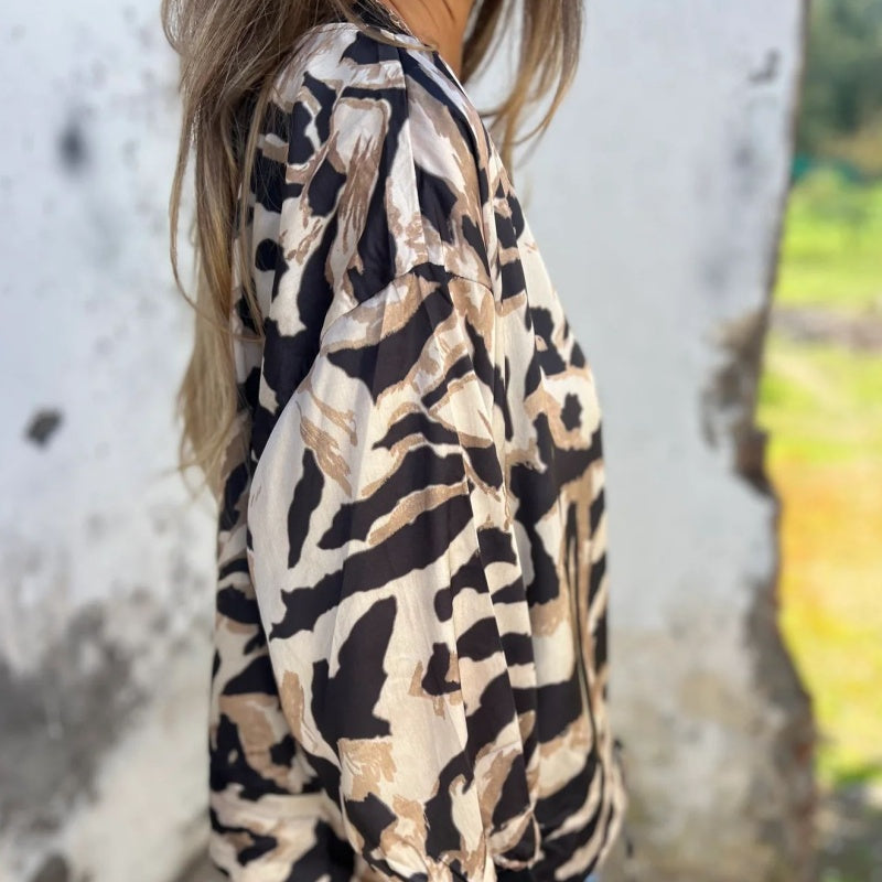 Elegantiškas leopardo rašto megztukas